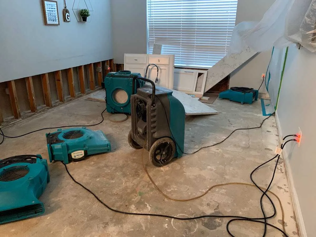 Dehumidifier in flood-cut room for Water Damage Restoration in Fort Campbell North